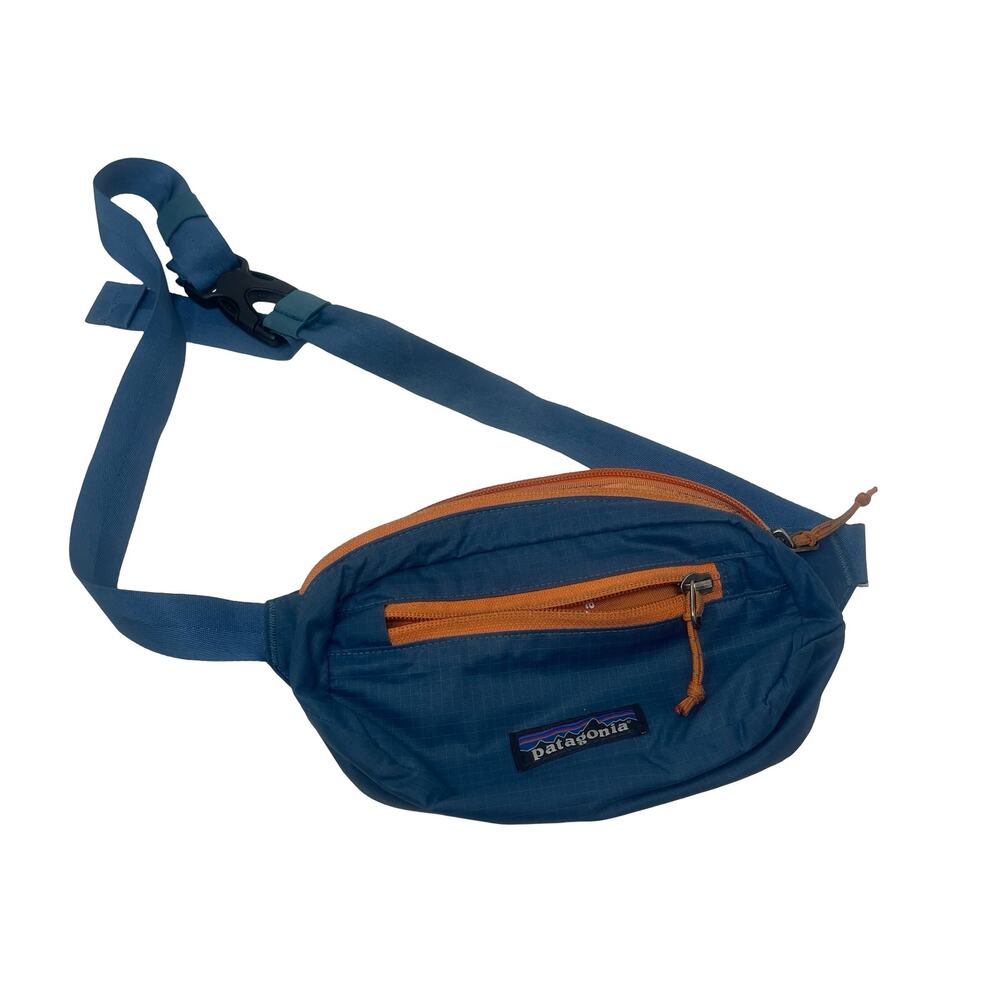 Patagonia Ultralight Black Hole Mini Hip Pack in blue orange